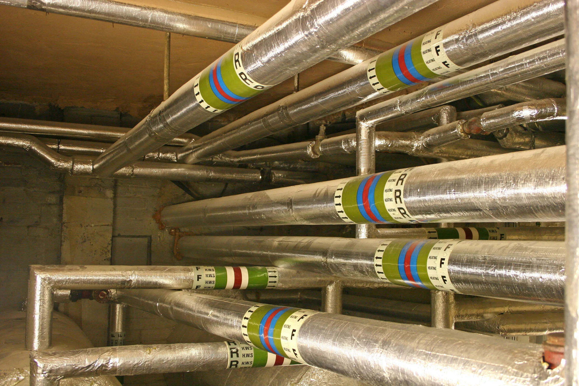 Industrial pipes covered with aluminum insulation